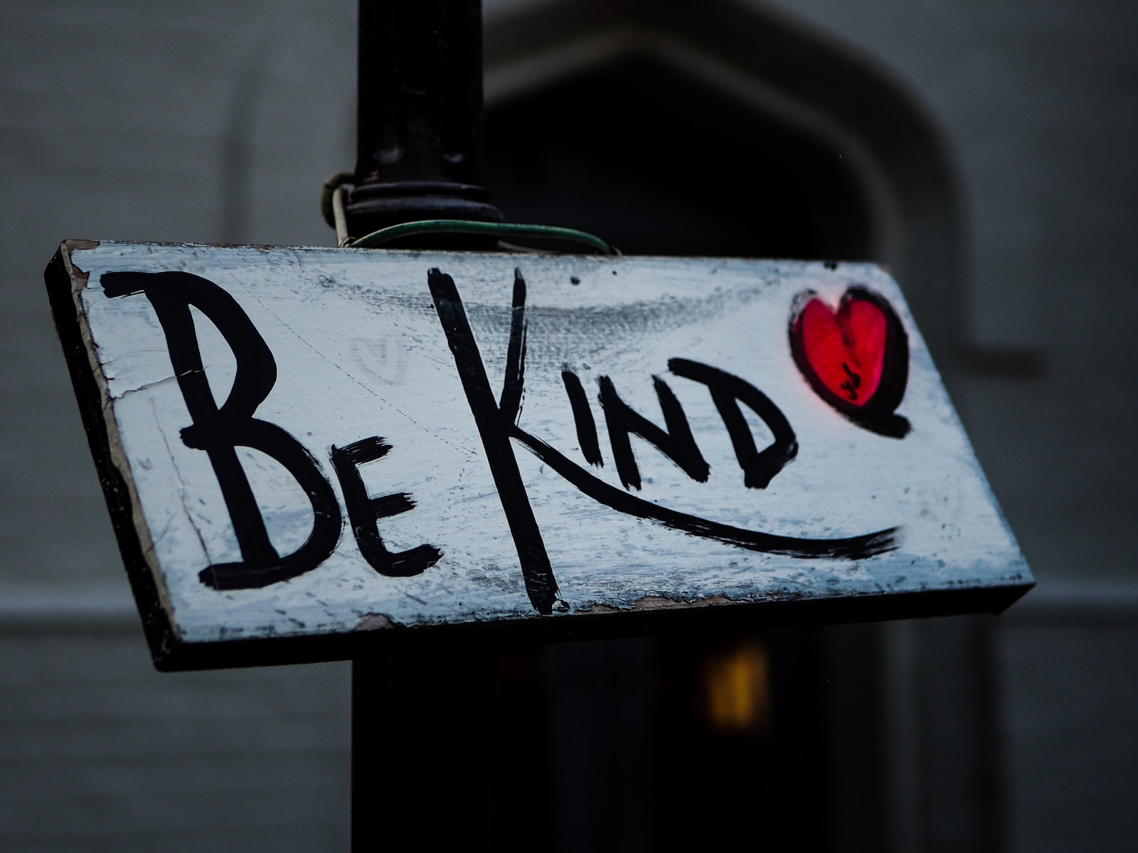 a sign spreading kindness and helping others